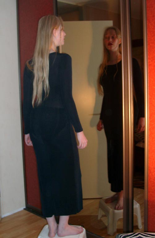 Harma in front of a mirror